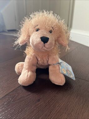 Vintage Ganz Webkinz Golden Retriever plush toy featuring fuzzy, textured cream